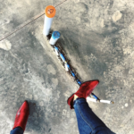 Fancy red shoes on pipe